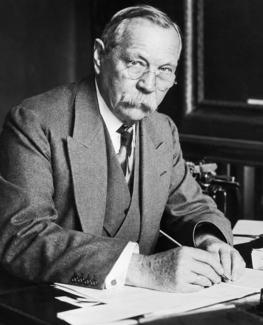 Arthur Conan Doyle at his writing desk, portrait reconstructed after a photograph